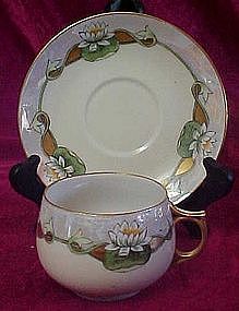 Vintage luseware cup and saucer set, water lilies