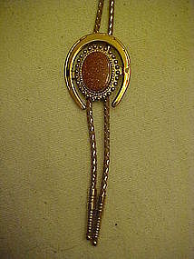 Gold stone lucky horseshoe bolo tie