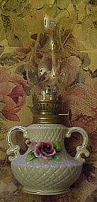 Miniature ceramic oil lamp, with applied pink rose