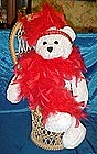 Singing, head bobbing flapper bear, red feather boa