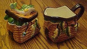 Fishing themed ceramic creamer and sugar, creel