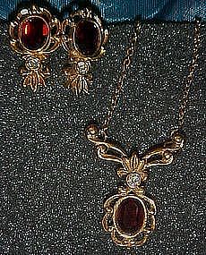 Juliette garnet necklace and matching earrings by Avon