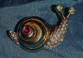 Adorable snail pin with rhinestone accents