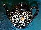 Old Chatsworth England glazed pottery teapot, florals