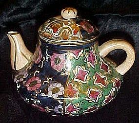 Highly decorated porcelain teapot, display /childs