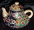Highly decorated porcelain teapot, display /childs