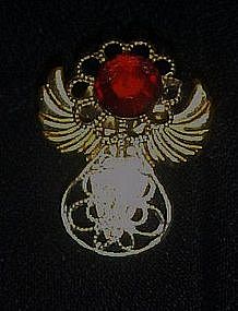 Small goldtone filigree angel pin. Ruby rhinestone