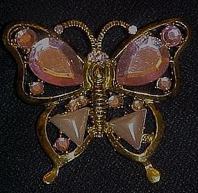 Pretty goldtone butterfly pin with pink accent stones