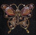 Pretty goldtone butterfly pin with pink accent stones