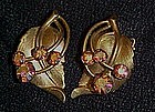 Vintage gold tone leaf earrings with aurora rhinestones