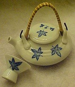 Individual tea pot with cup. Cobalt maple leaf pattern