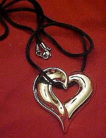 Avon silver  floating heart necklace,  silk cord