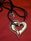 Avon silver  floating heart necklace,  silk cord