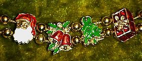 Gold tone Christmas charms slide bracelet,