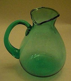 Teal green hand blown glass pitcher 5"