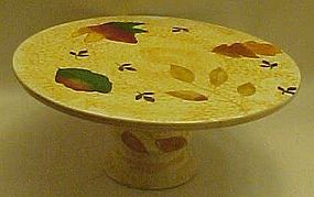 Ceramic pedestal cake plate with Tuscan leaves design