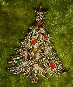 Gold tone Christmas tree pin with rhinestones & jewels