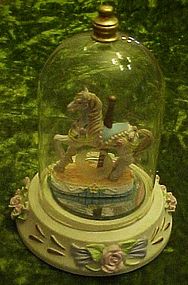 Carousel horse figurine in glass dome