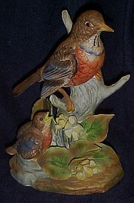 Large robin with baby porcelain bird figurine