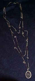 Goldette triple strand silvertone, crystal intaglio