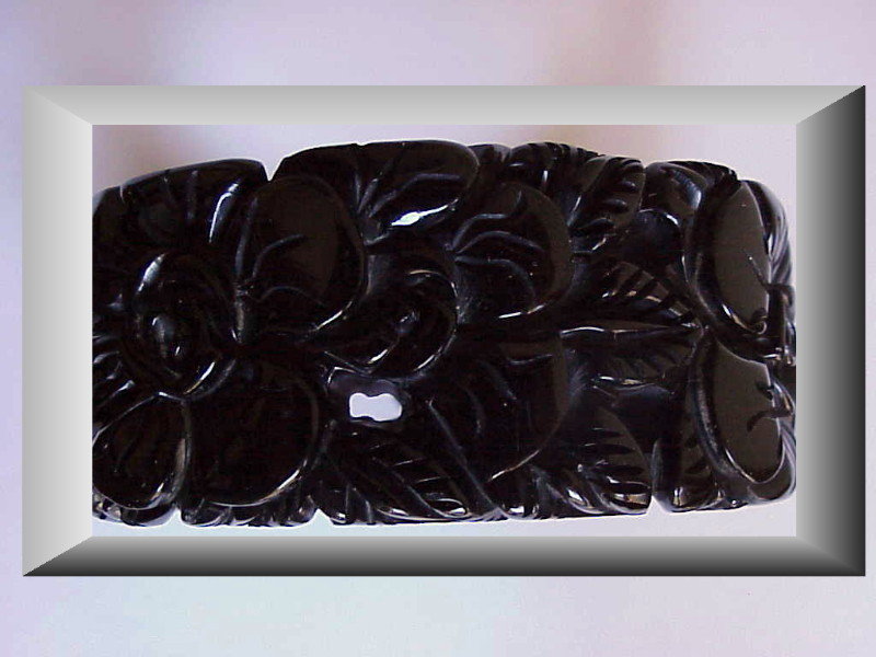 Bakelite carved floral clamp bracelet -Vintage