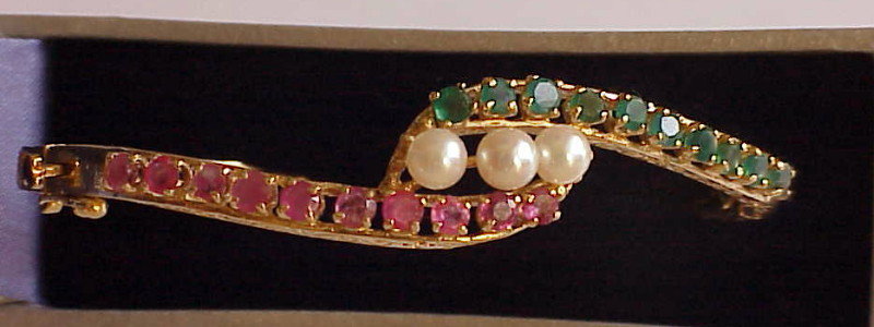 14K hinged bangle bracelet, emeralds, rubies, pearls