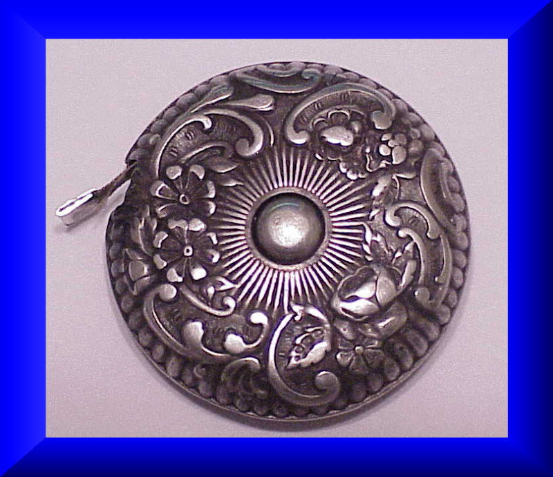 Gorham Sterling repousse tape measure #18
