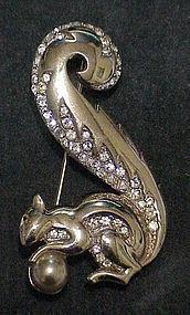 Boucher squirrel holding a pearl brooch-1948