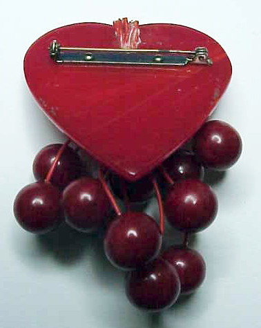 Bakelite heart pin with 12 berries