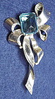 Reja  sterling bow  brooch-topaz colored  center stone