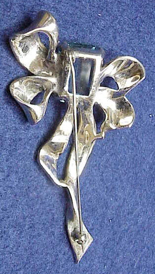 Reja  sterling bow  brooch-topaz colored  center stone