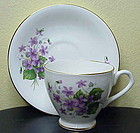 Regency purple violets green leaves scallop cup & sauce
