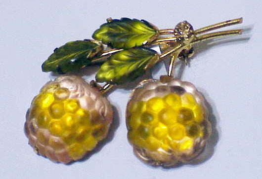 Austrian raspberry  brooch with frosted green leaves