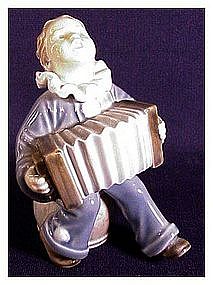 Royal Copenhagen porcelain child with accordion # 3667