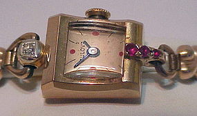 14K rose gold diamond & rubies Bulova Lady's wristwatch