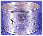 Sterling: Hammered napkin ring with cartouch- Webster