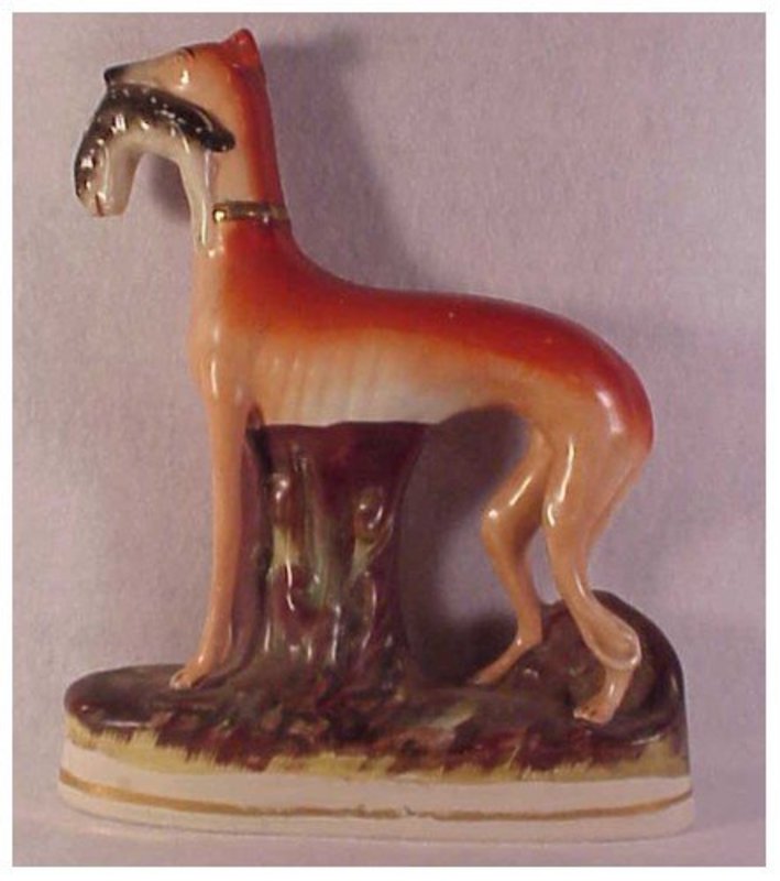 Staffordshire standing greyhound and hare figurine