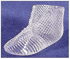 Circa 1900 ribbed glass bootee with a diamond pattern