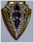 McClelland Barclay fur clip seated on heraldic shield