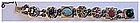 Reinad gold filigree & multi color gems link bracelet
