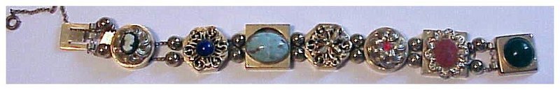 Reinad gold filigree & multi color gems link bracelet