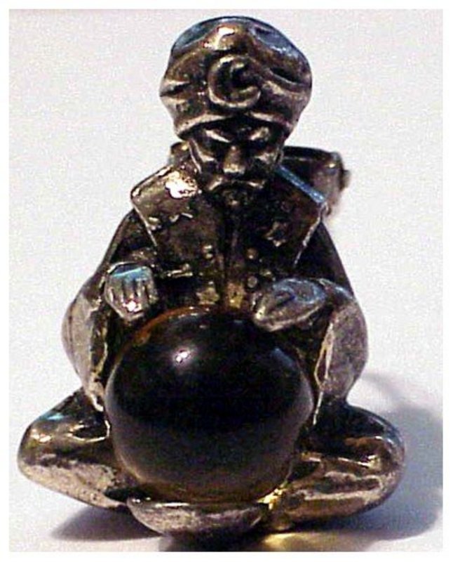 Korda 'Thief of Bagdad" genie with crystal ball clip