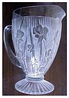 Iris, Iris & Herringbone 9 1/2" pitcher clear footed