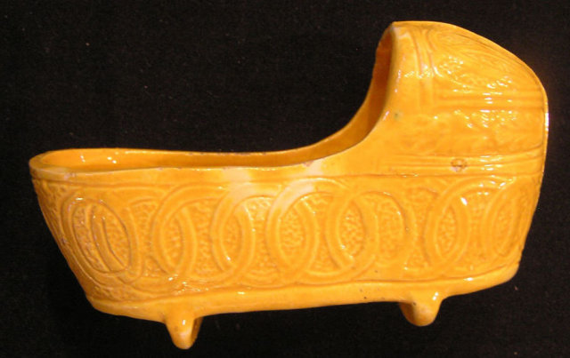 Staffordshire Cradle of Yellow Glazed Pottery