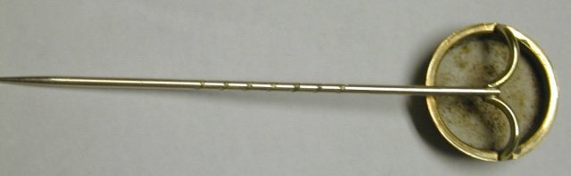 Stickpin of an enameled foxhead set in 15K gold