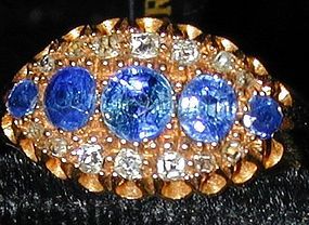 Ring of 5 sapphires and 14 diamonds in 18K gold