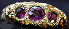 Ring of 3 stone amethyst set in chased 14K