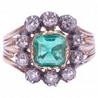 C1840 18K Emerald and Diamond Cluster Ring
