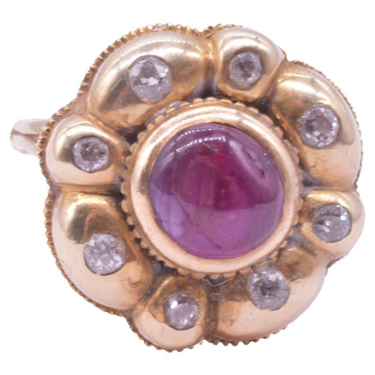 18 Carat Iberian Cluster ring with Diamonds and Cabochon Ruby