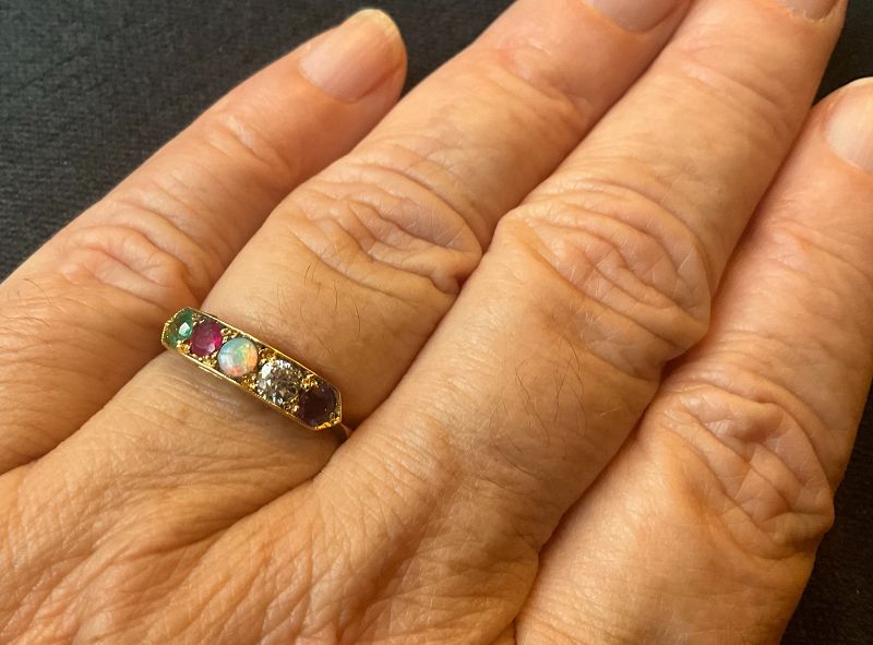 C1860 18k 5 Stone ADORE Message Ring ameth diam opal ruby emerald